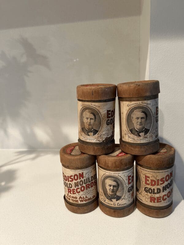 A group of six rolls of edison gold record.